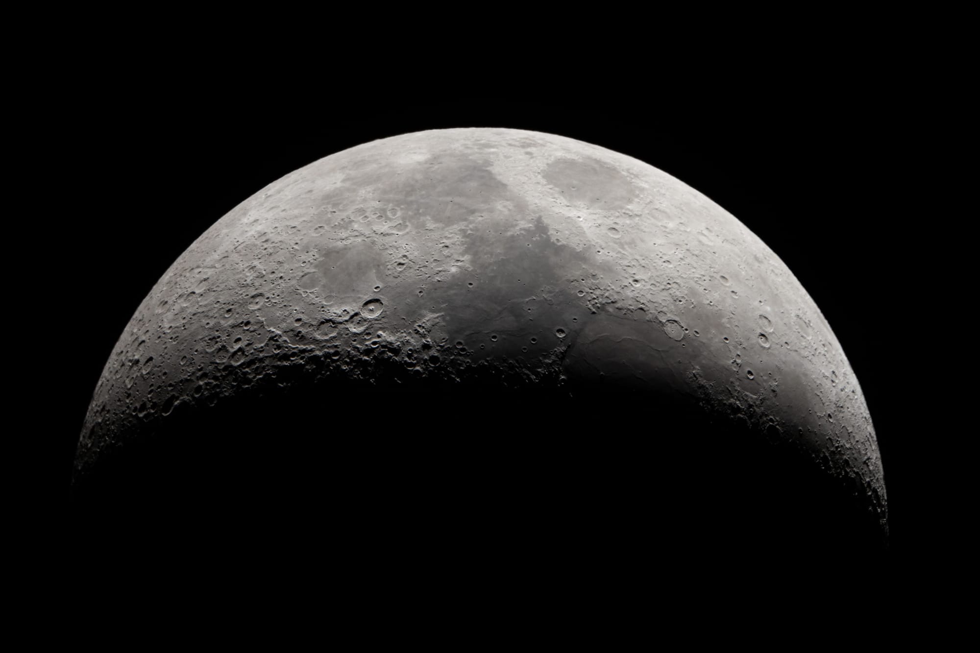 The moon in half-darkness