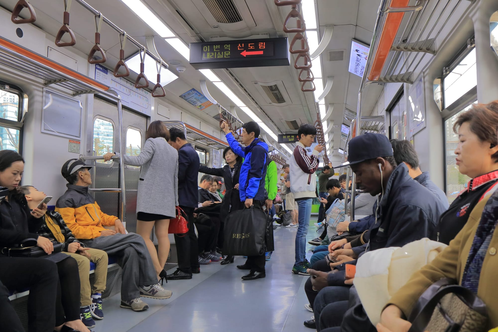 Commuters on a train in South Korea