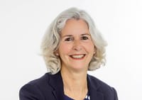 Portrait headshot of a smiling Jenny Gamble