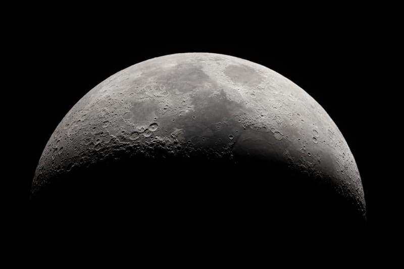 The moon in half-darkness